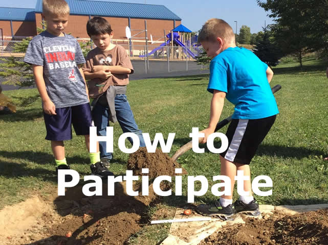 Photo of students digging a garden