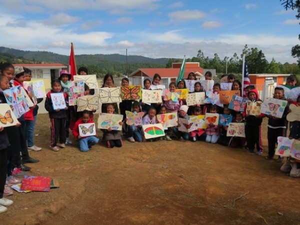 Students in Mexico holding Ambassador Monarchs