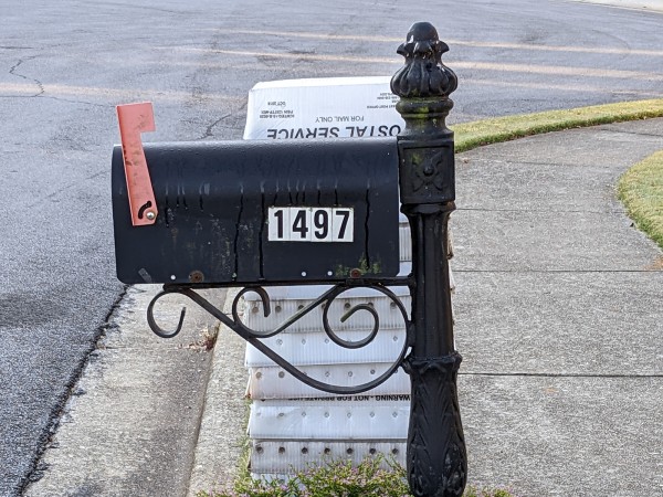 Symbolic Migration envelopes being mailed